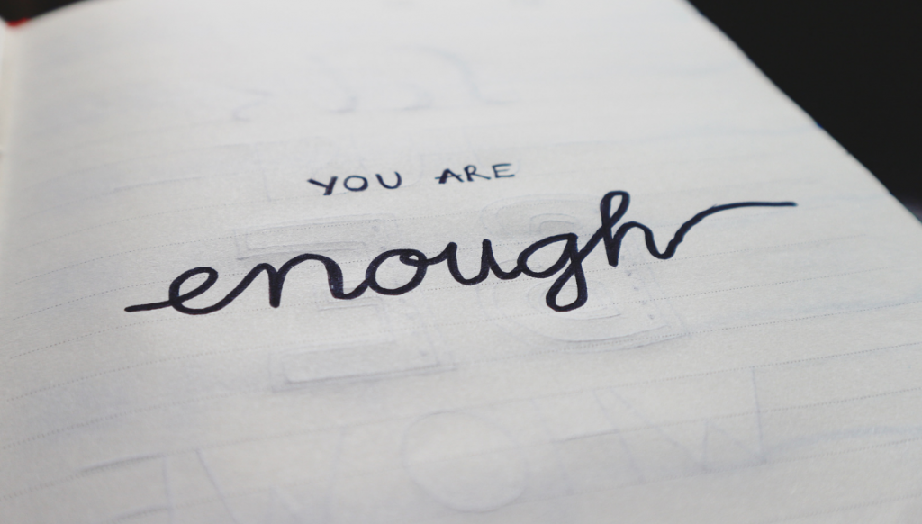 "you are enough" text linked to Is scarcity mindset stealing your mojo blog post.